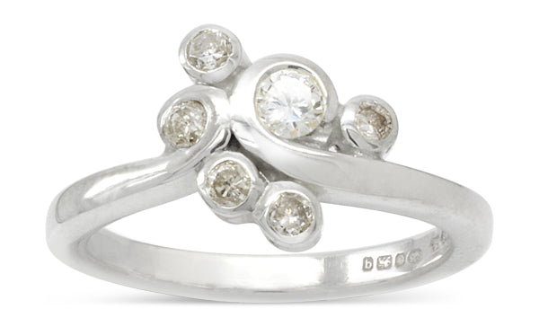 handmade diamond and platinum swirl ring