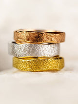 Three wedding rings stacked