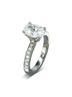 Claw Oval Diamond Engagement Ring and Pavé Set Diamond Band Ring Pruden and Smith   