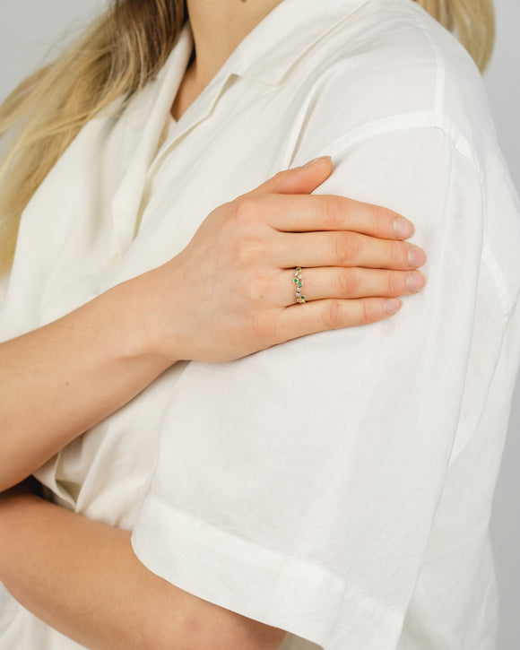 Water Bubbles Offset Emerald Diamond Half Eternity Ring Ring Pruden and Smith