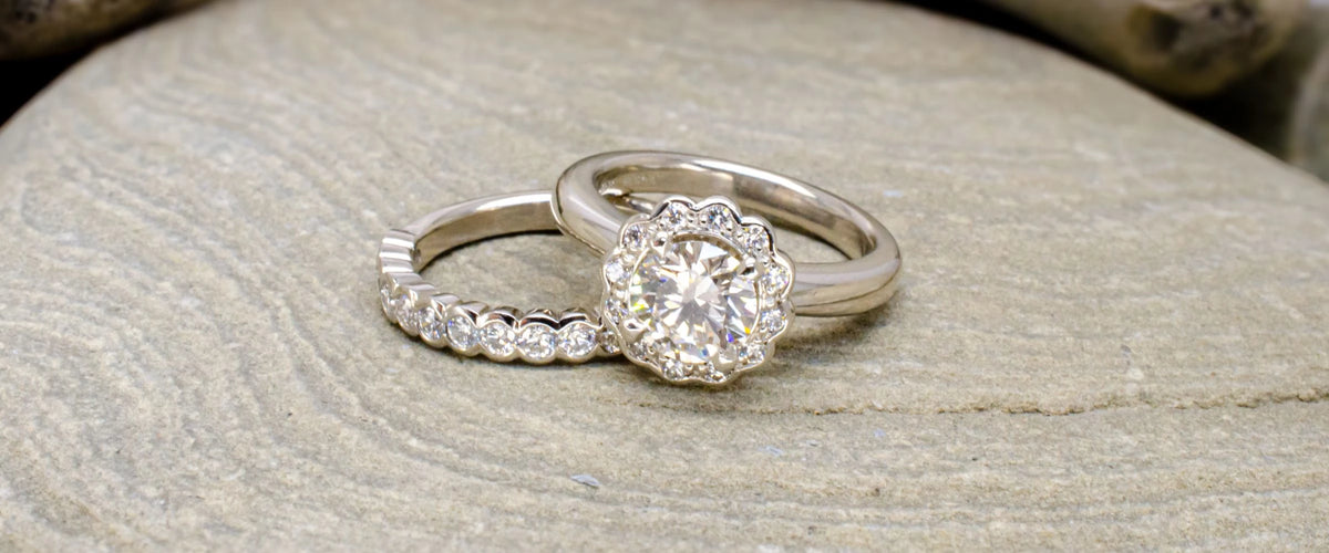 Cluster engagement ring on stone background