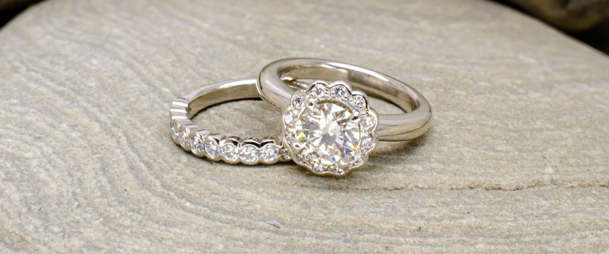 Cluster engagement ring on stone background