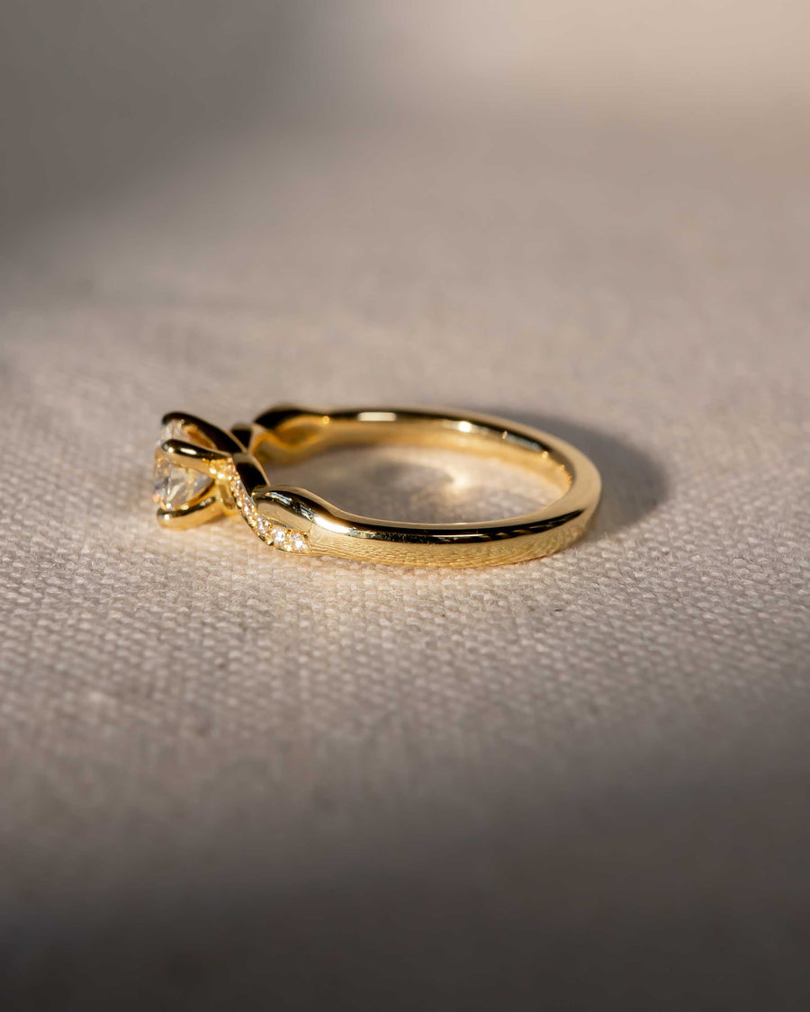 Handmade 0.53ct Natural Round Cut Twist Claw Engagement Ring by Pruden & Smith