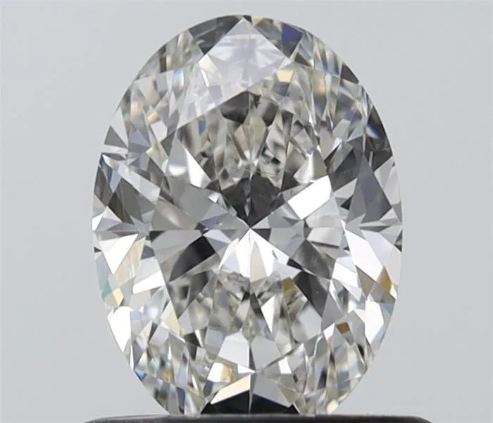 Oval cut diamond gemstone with sparkling facets on a neutral background
