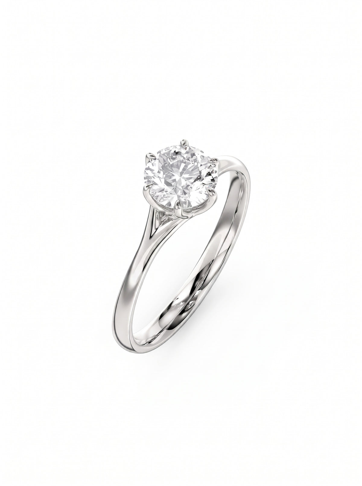 Round cut diamond engagement ring in a silver-toned metal band with a six-prong tulip claw setting.