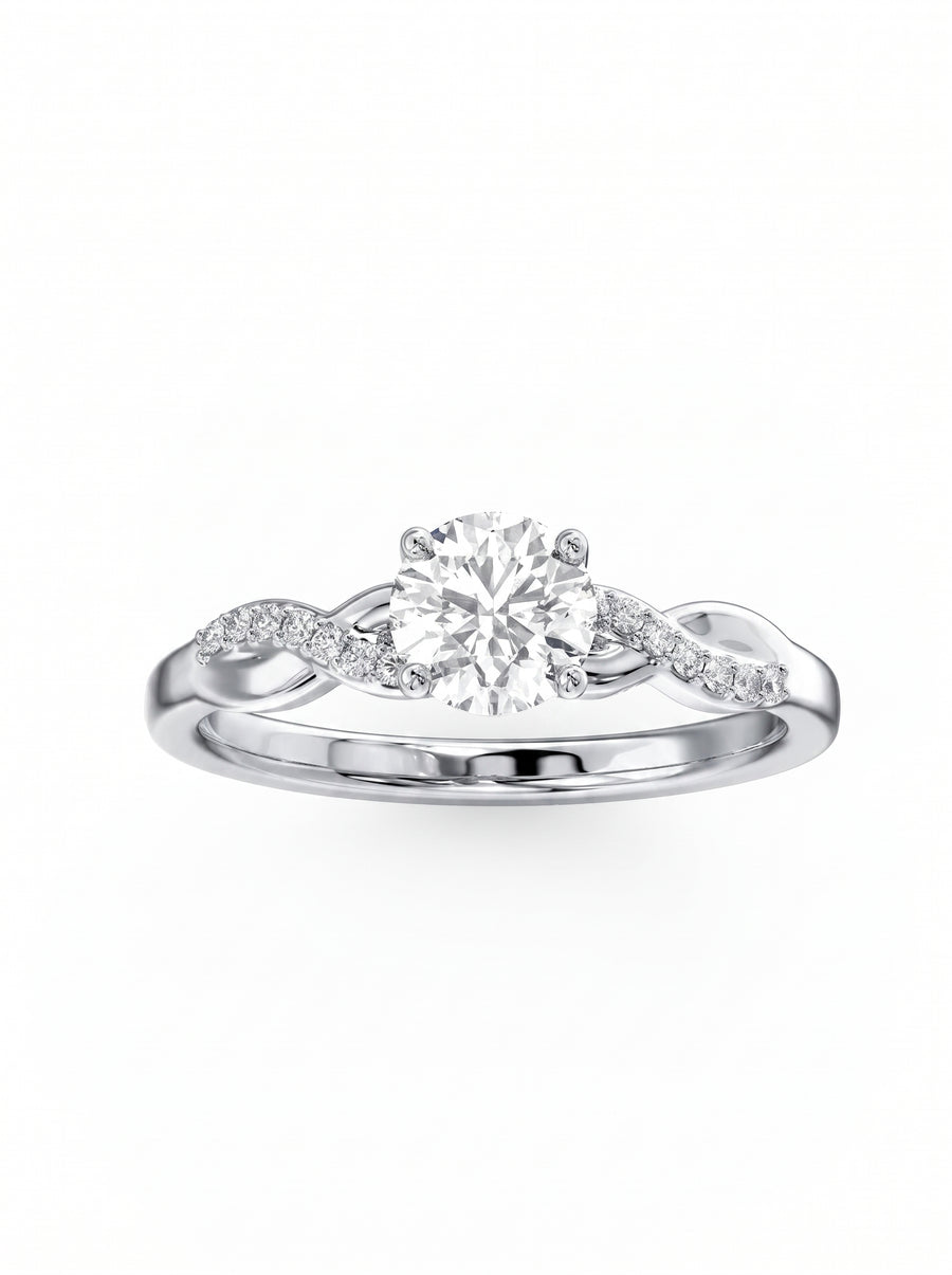 Round cut diamond engagement ring with a twist band in polished white gold.
