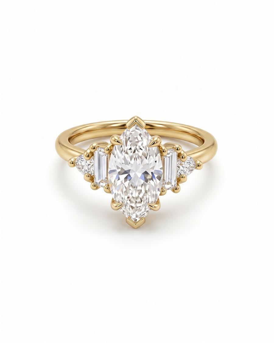 1.89ct marquise cut diamond engagement ring in yellow gold with baguette and round side stones.