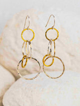 drop earrings in silver and gold
