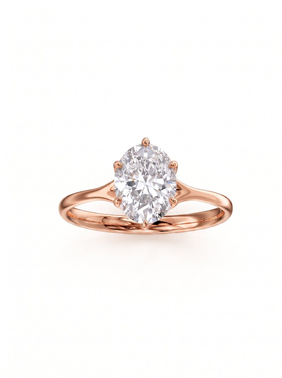 Oval cut diamond engagement ring with a tulip claw setting on a polished rose gold band.