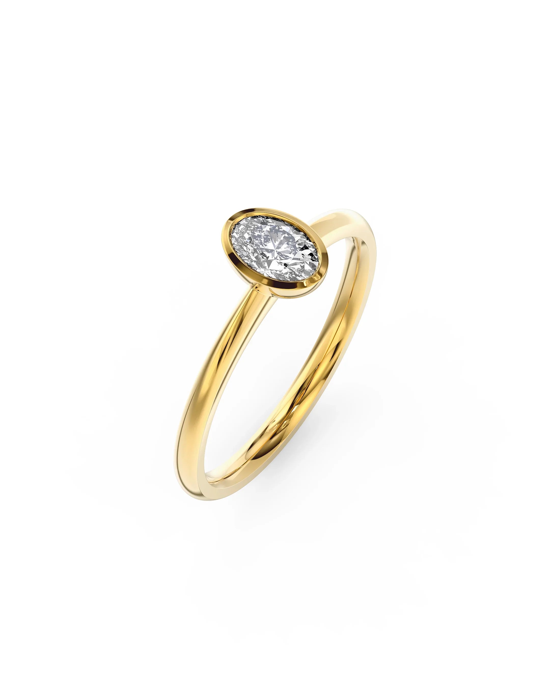 Yellow gold ring with an oval-cut diamond solitaire on a plain band