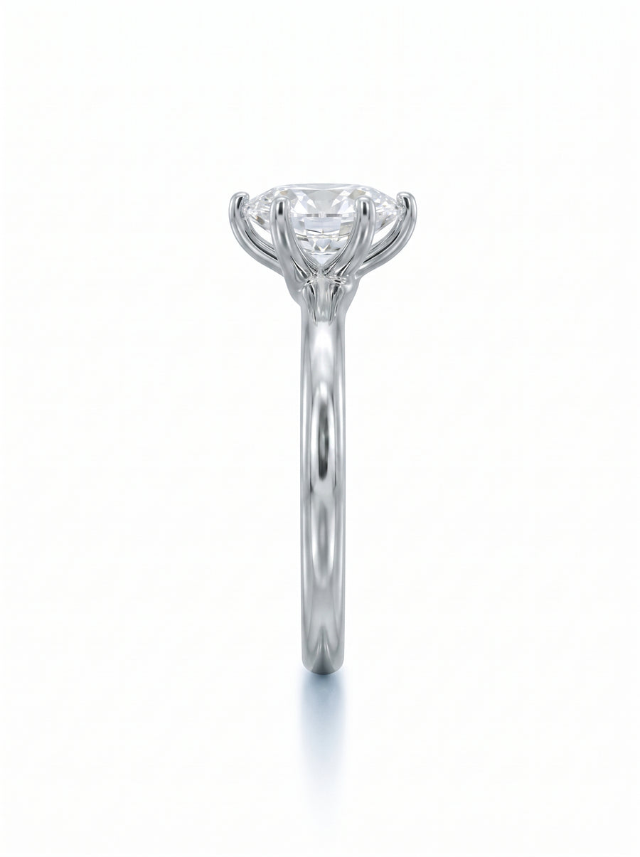 Oval diamond engagement ring in polished platinum with a six-prong setting and a twisted band design.