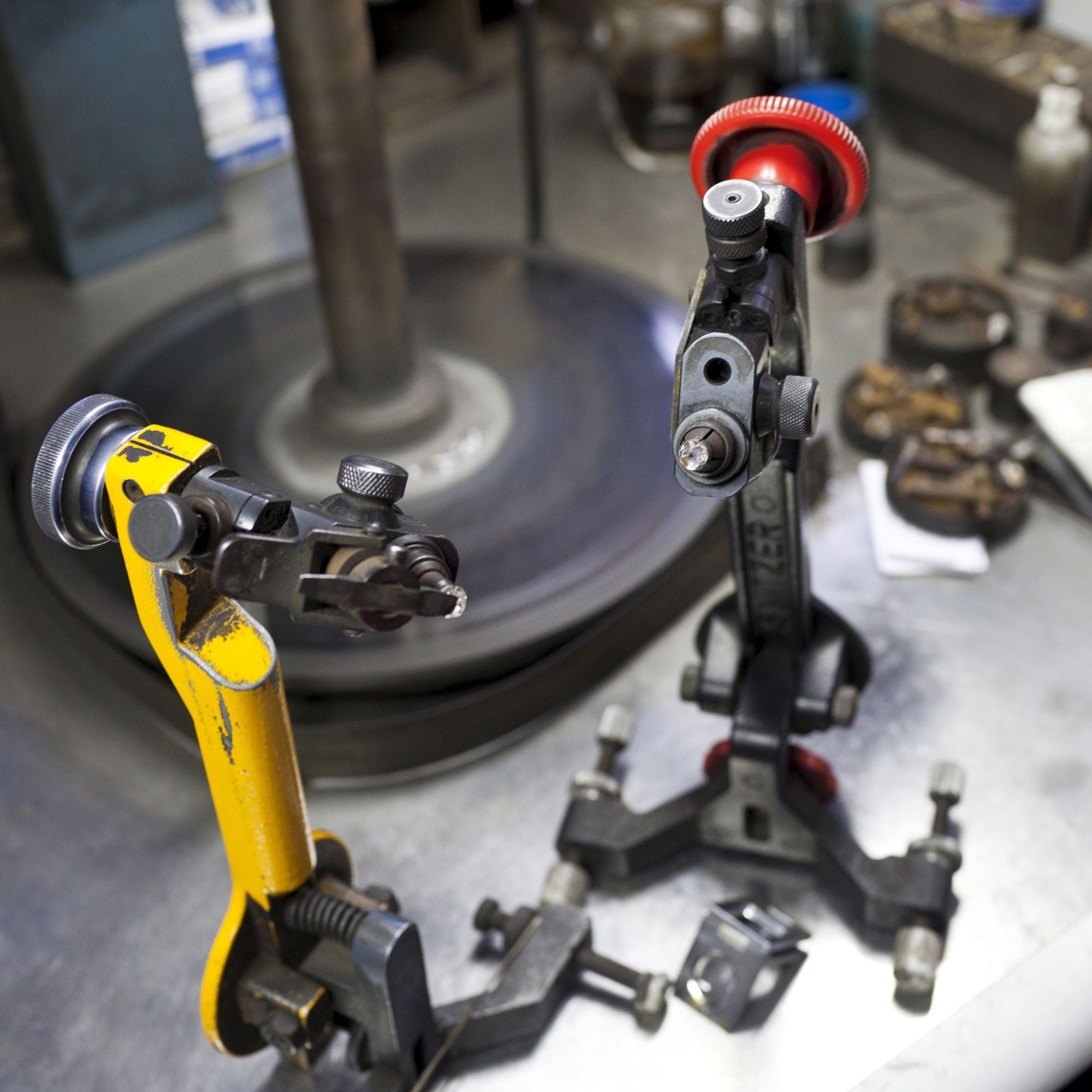 two diamonds in front of a cutter