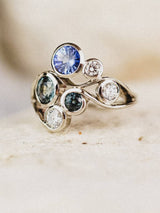 cluster ring with stone background