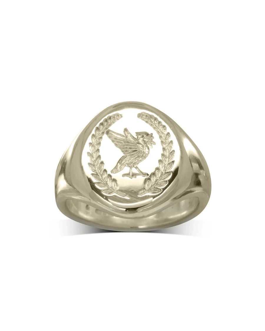 White gold custom signet ring with engraved bird and laurel wreath design, handmade luxury jewellery