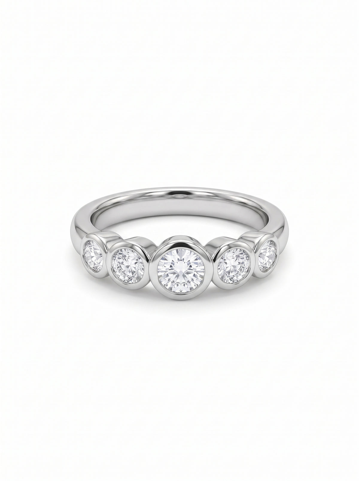 Platinum eternity ring featuring five bezel-set round brilliant cut diamonds in a graduated design.