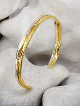 Trap Sussex Shore Bangle on Stone Background