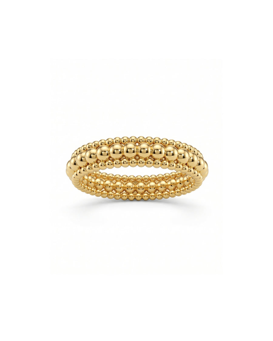 Three-row ring crafted in 18ct yellow gold featuring a textured design of polished spherical beads.