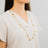 Opera Length Gold Disc Necklace by Pruden and Smith | DSC01279.jpg