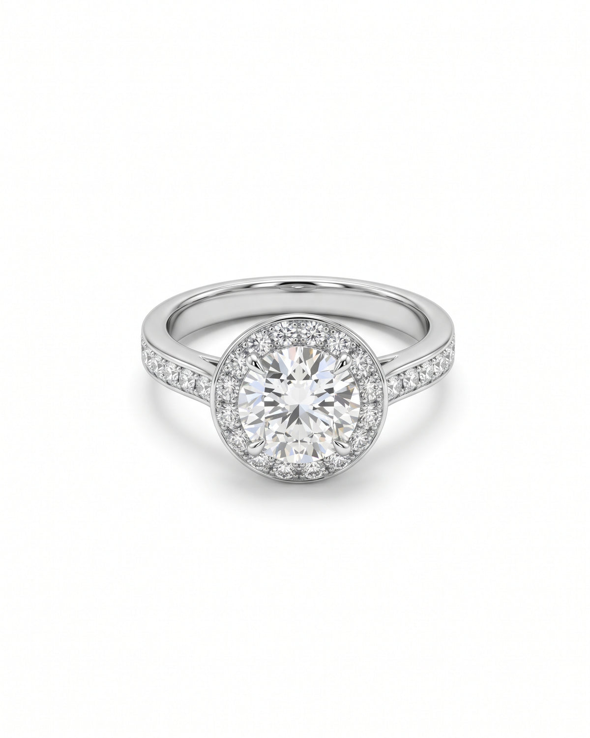 Round diamond engagement ring with a halo setting and pavé diamonds on a silver band.