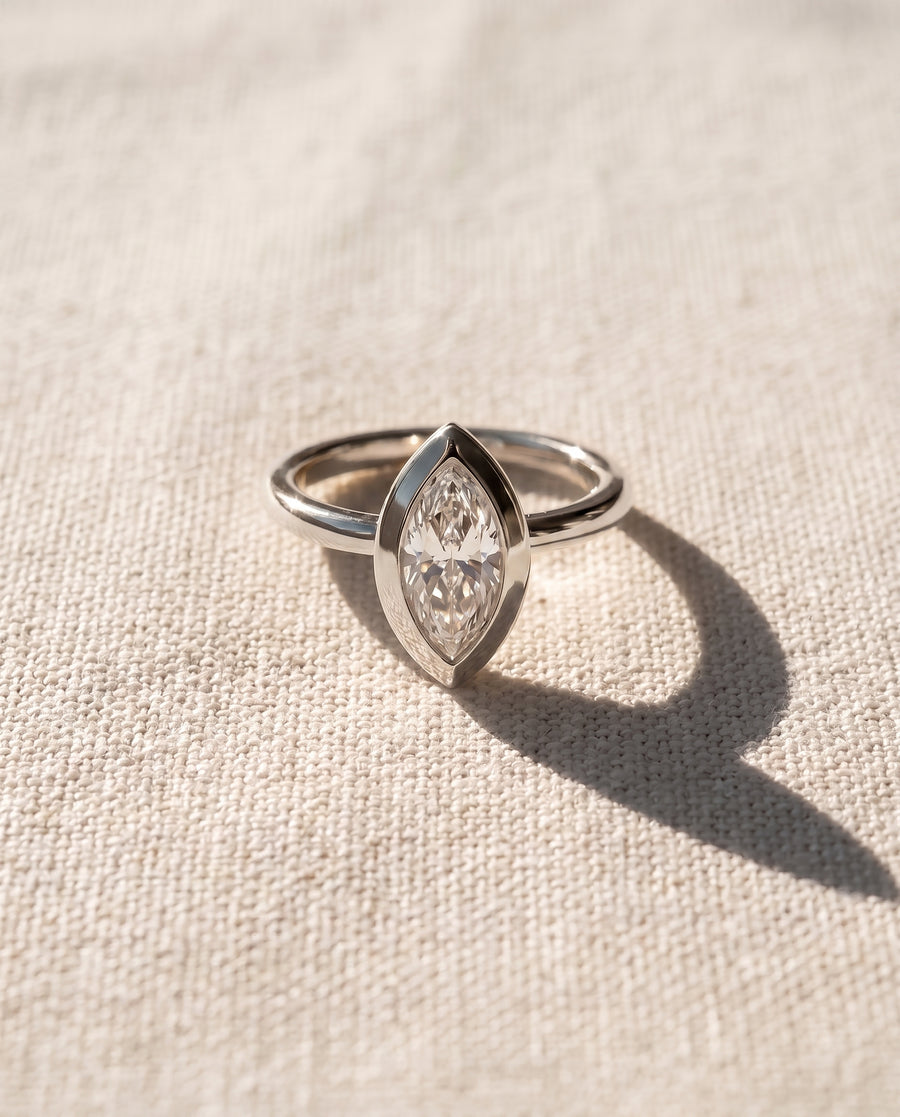 Marquise Cut Bezel Cathedral Engagement Ring