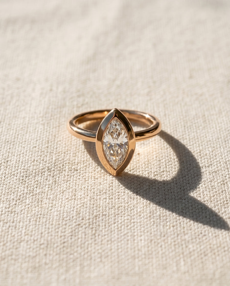 Marquise Cut Bezel Cathedral Engagement Ring