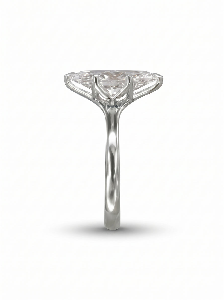 Marquise cut diamond engagement ring in polished platinum with a tulip claw setting.