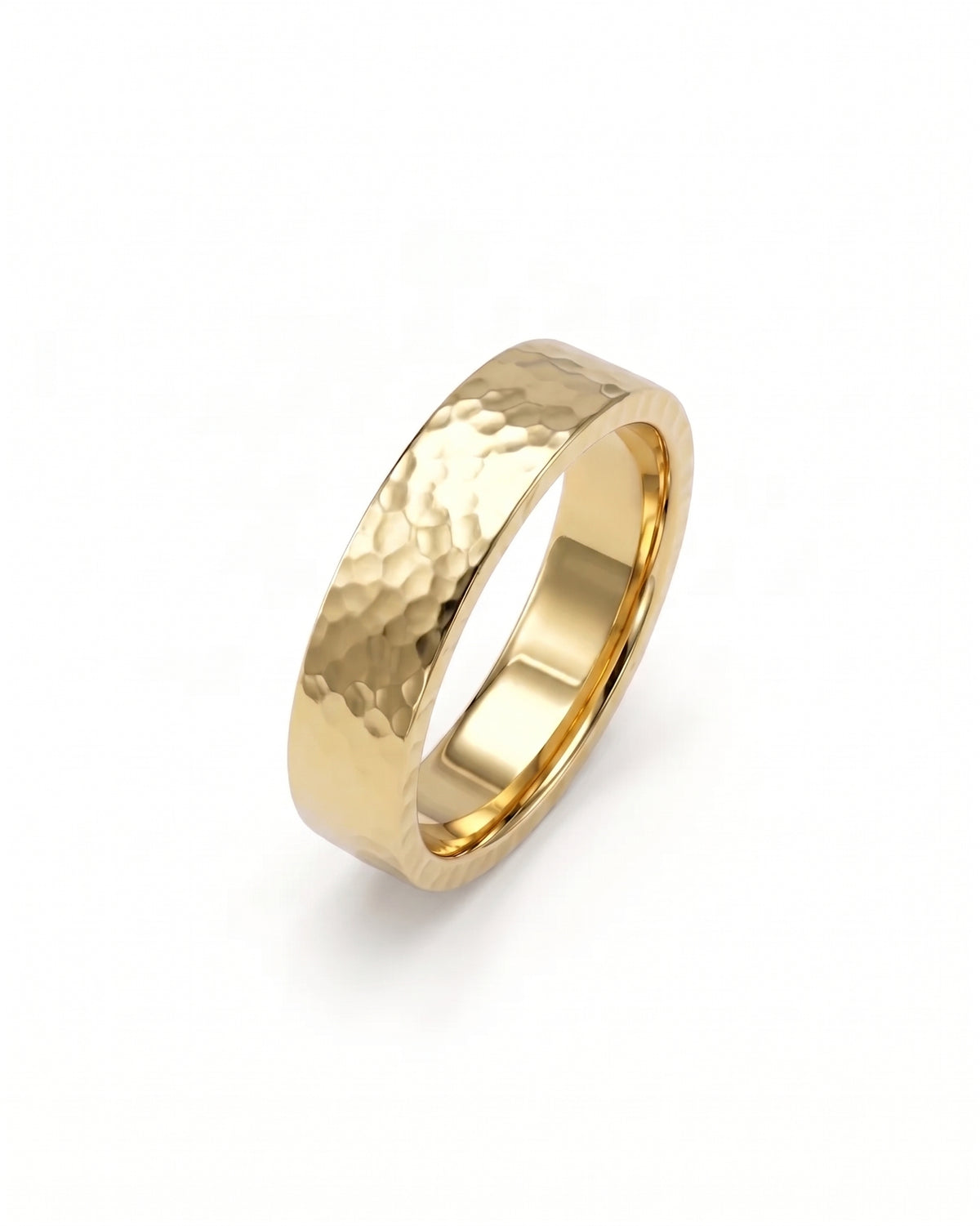 Flat gold wedding ring with a hammered texture finish on a white background.