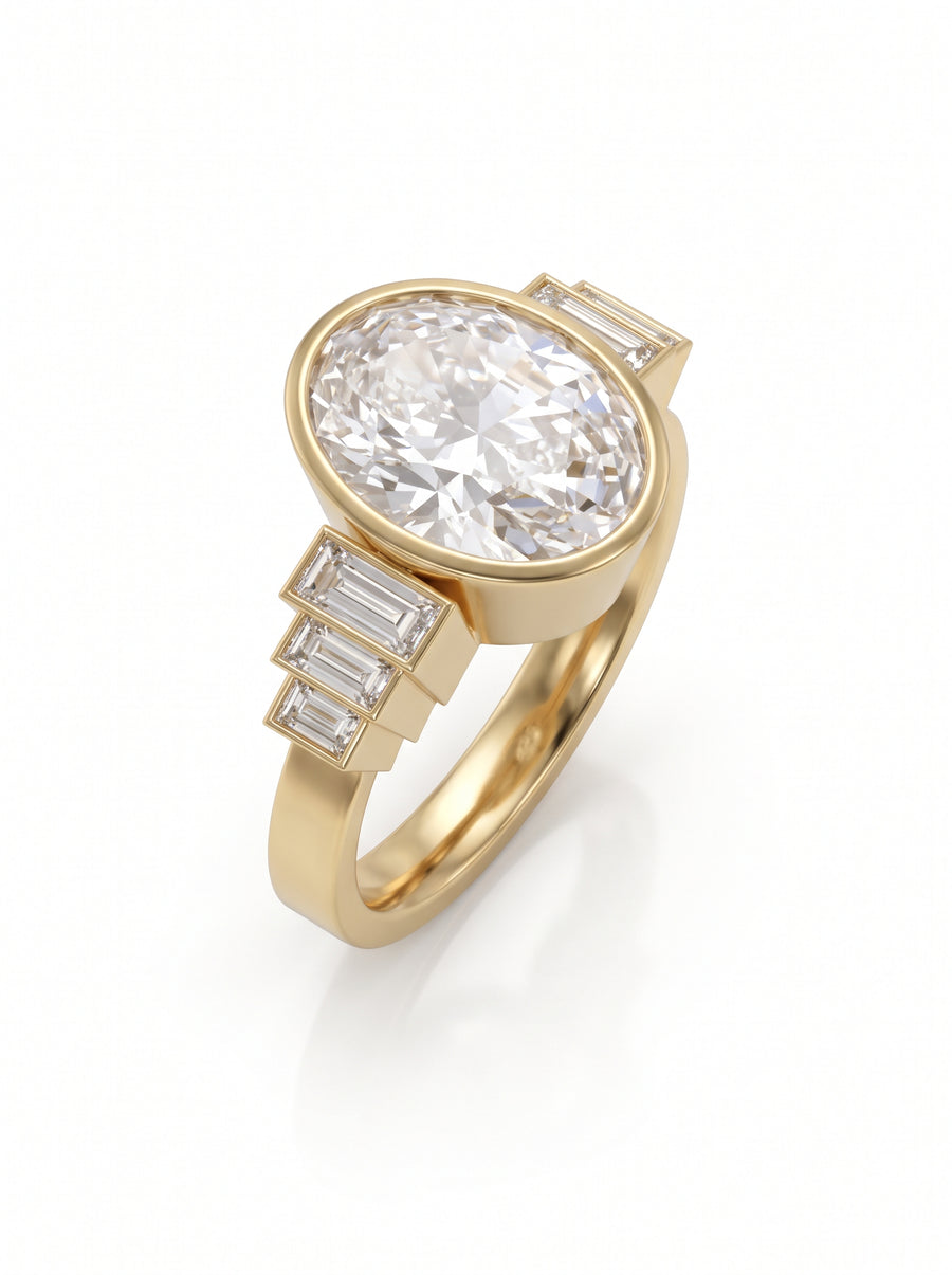 Gold engagement ring with a bezel-set oval diamond and three baguette diamonds on each side.