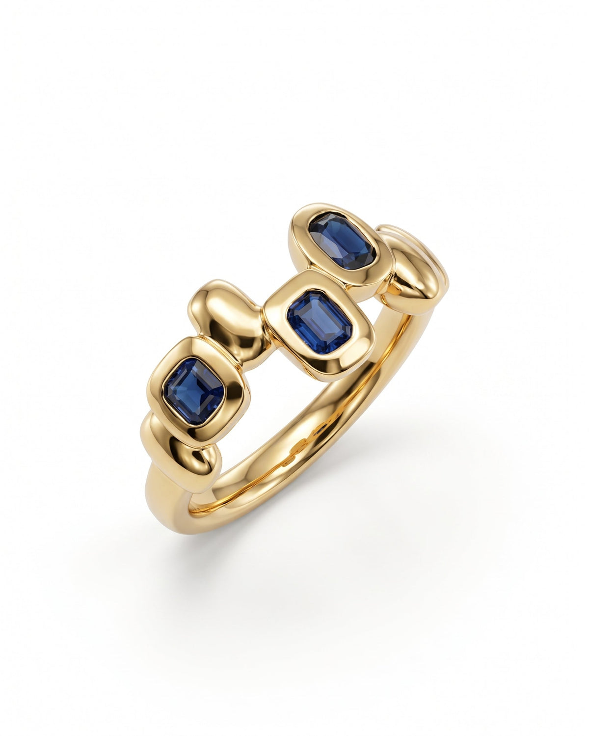 Gold eternity ring featuring three rectangular blue sapphire gemstones set in smooth, pebble-shaped metal links.