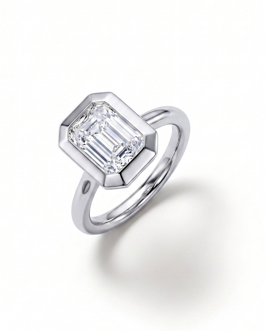 Emerald Cut Bezel Cathedral Engagement Ring