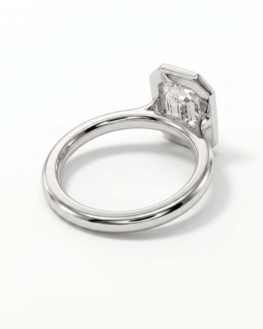Emerald Cut Bezel Cathedral Engagement Ring