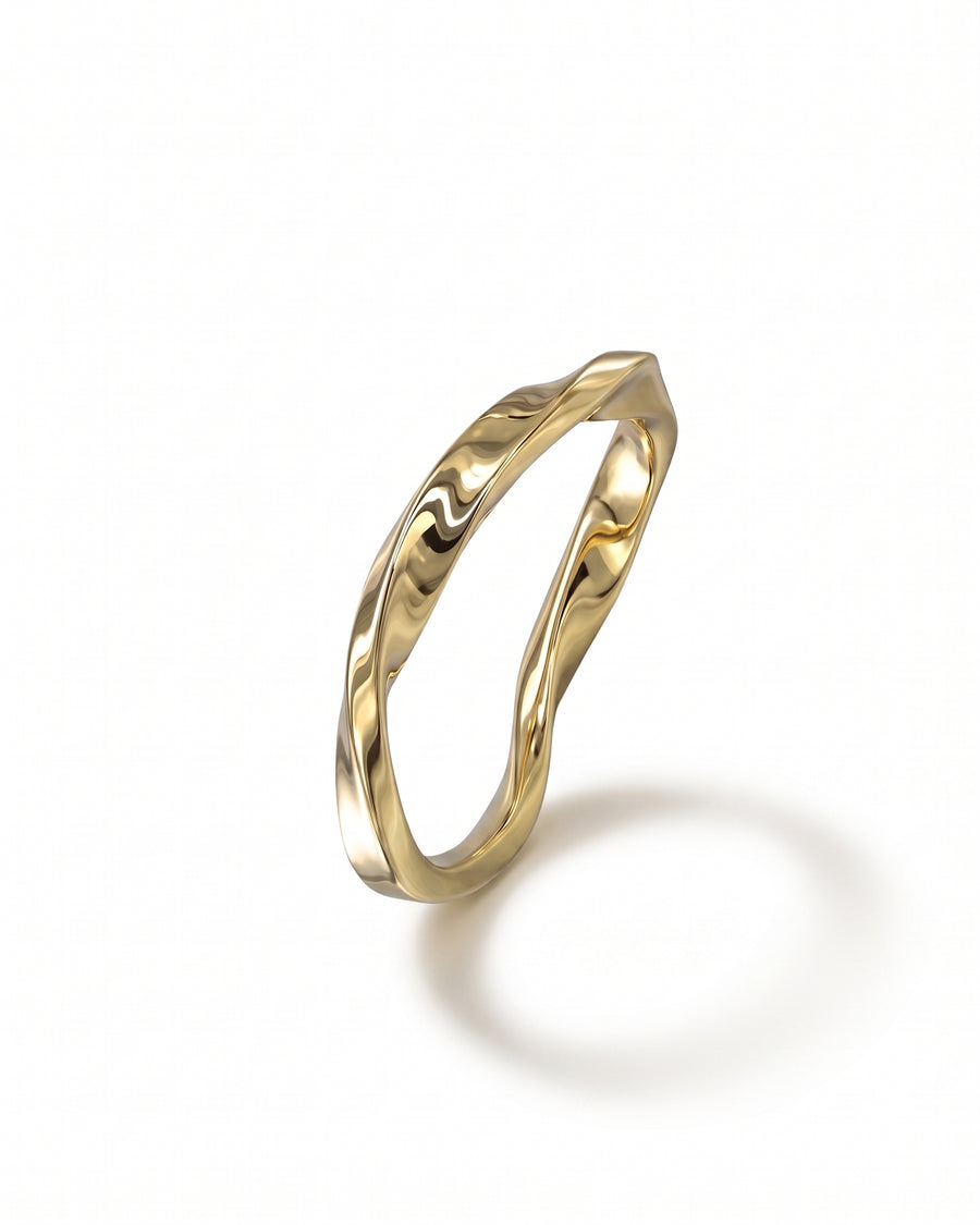 Polished yellow gold ring featuring a continuous, irregular twisted band design on a white background.