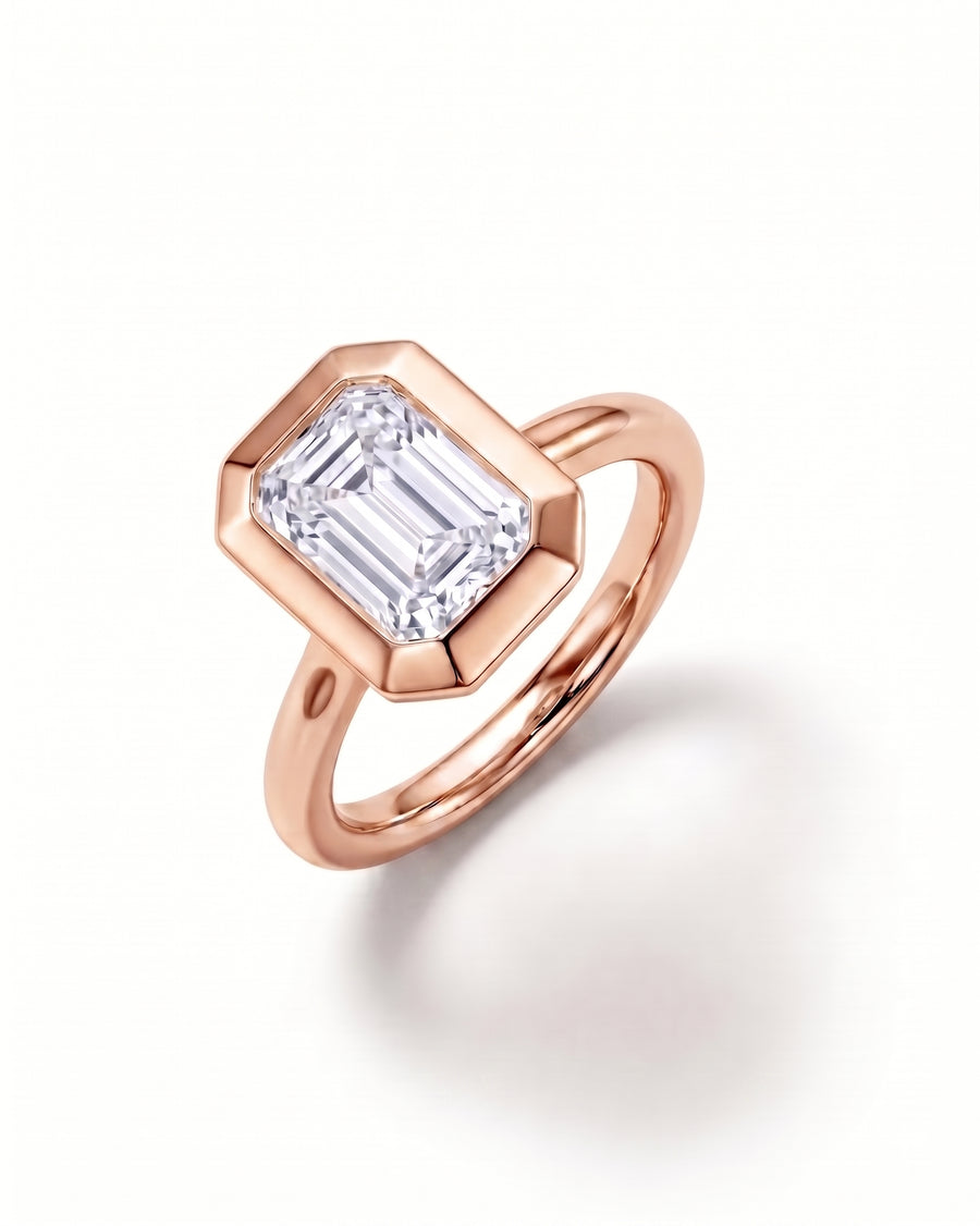 Emerald Cut Bezel Cathedral Engagement Ring