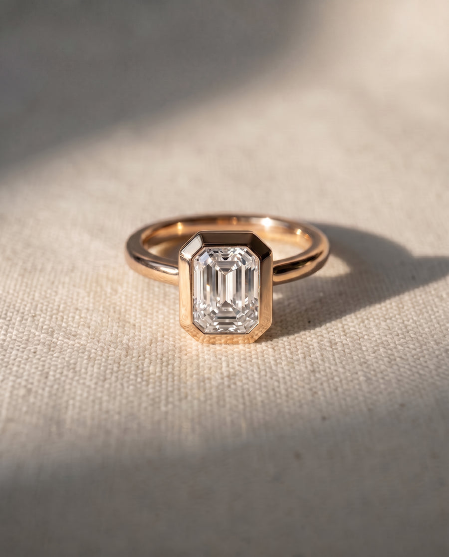 Emerald Cut Bezel Cathedral Engagement Ring