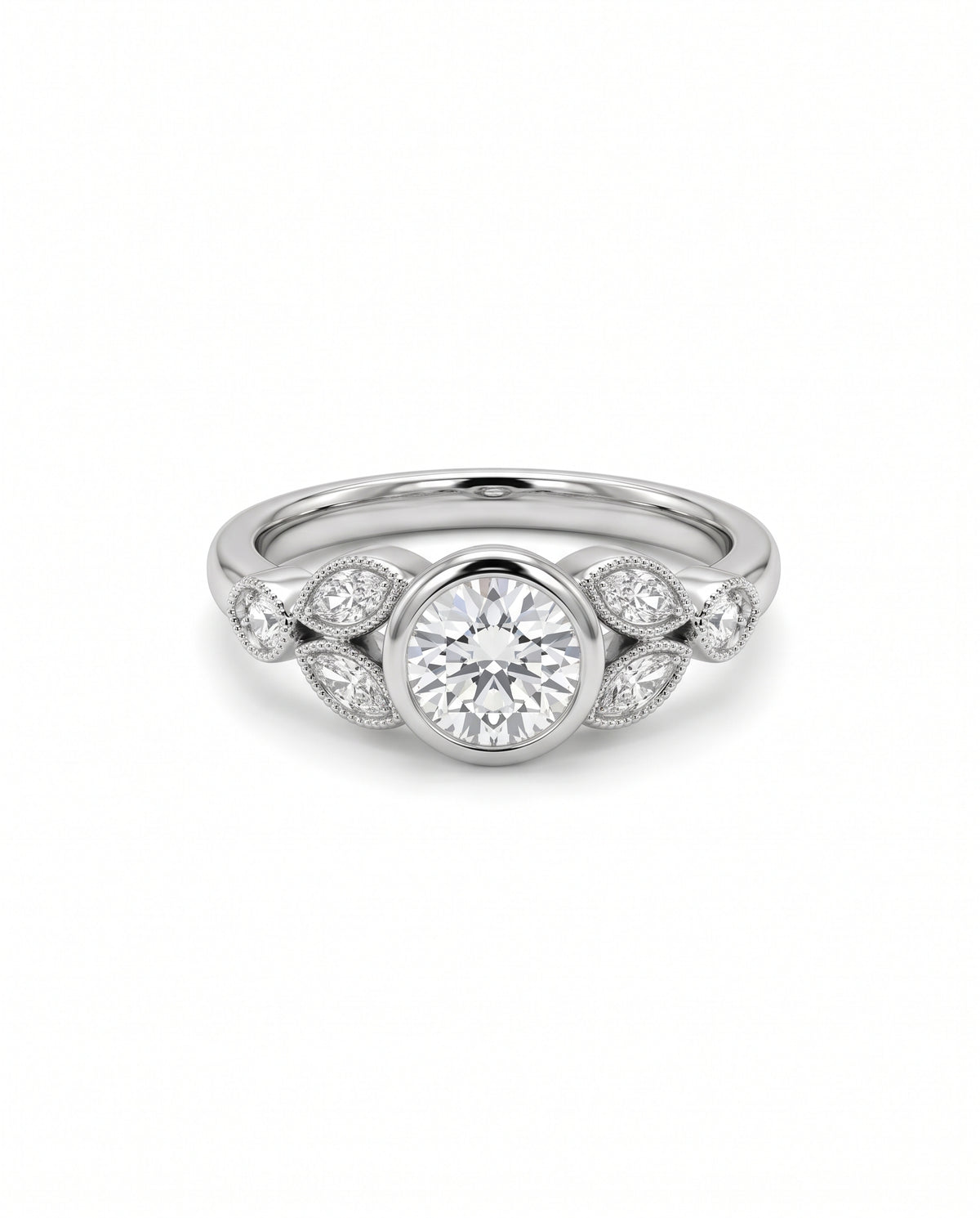 Vintage platinum engagement ring with a round bezel-set center diamond and marquise side stones.