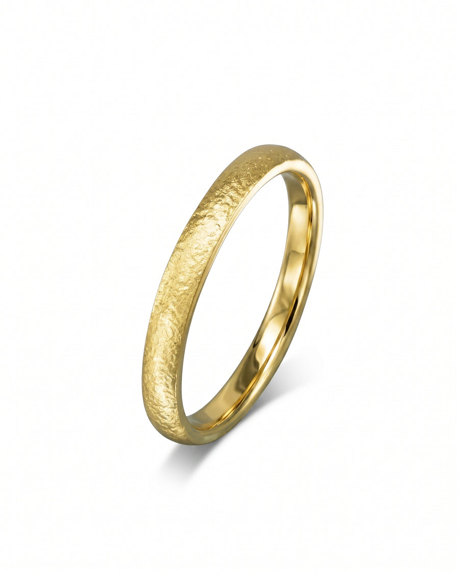 Yellow gold court wedding band with a textured matte finish and polished inner surface.