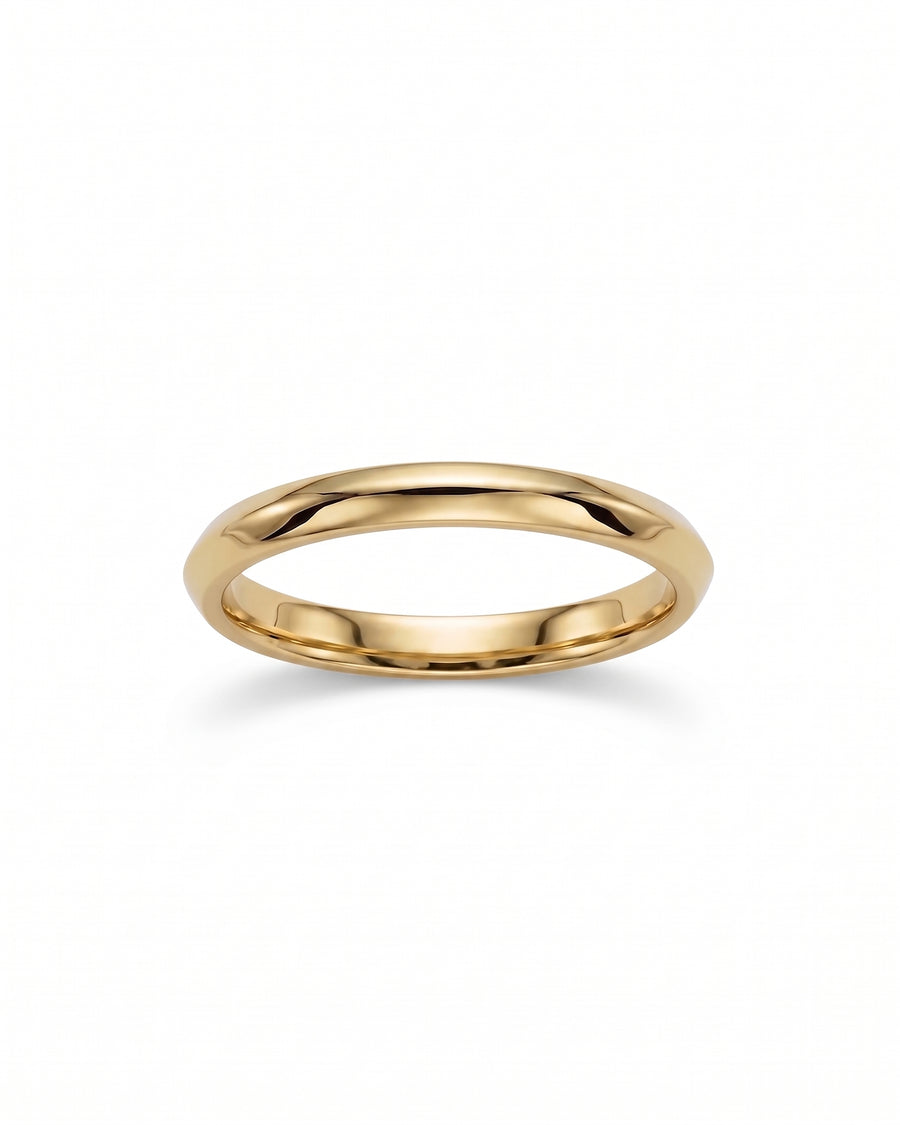 Polished yellow gold wedding band with a smooth, rounded dome profile on a white background.