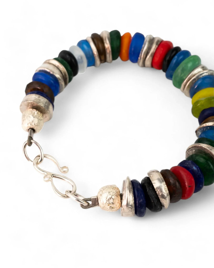 Handmade bracelet with multi-coloured recycled glass beads and silver accents