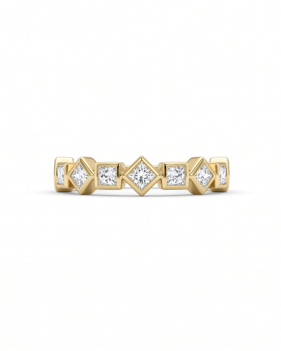 Yellow gold half eternity ring with alternating princess cut diamonds.