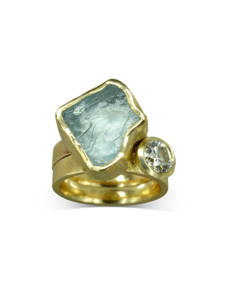 Gold stacking ring set with raw aquamarine chunk and round diamond, organic design