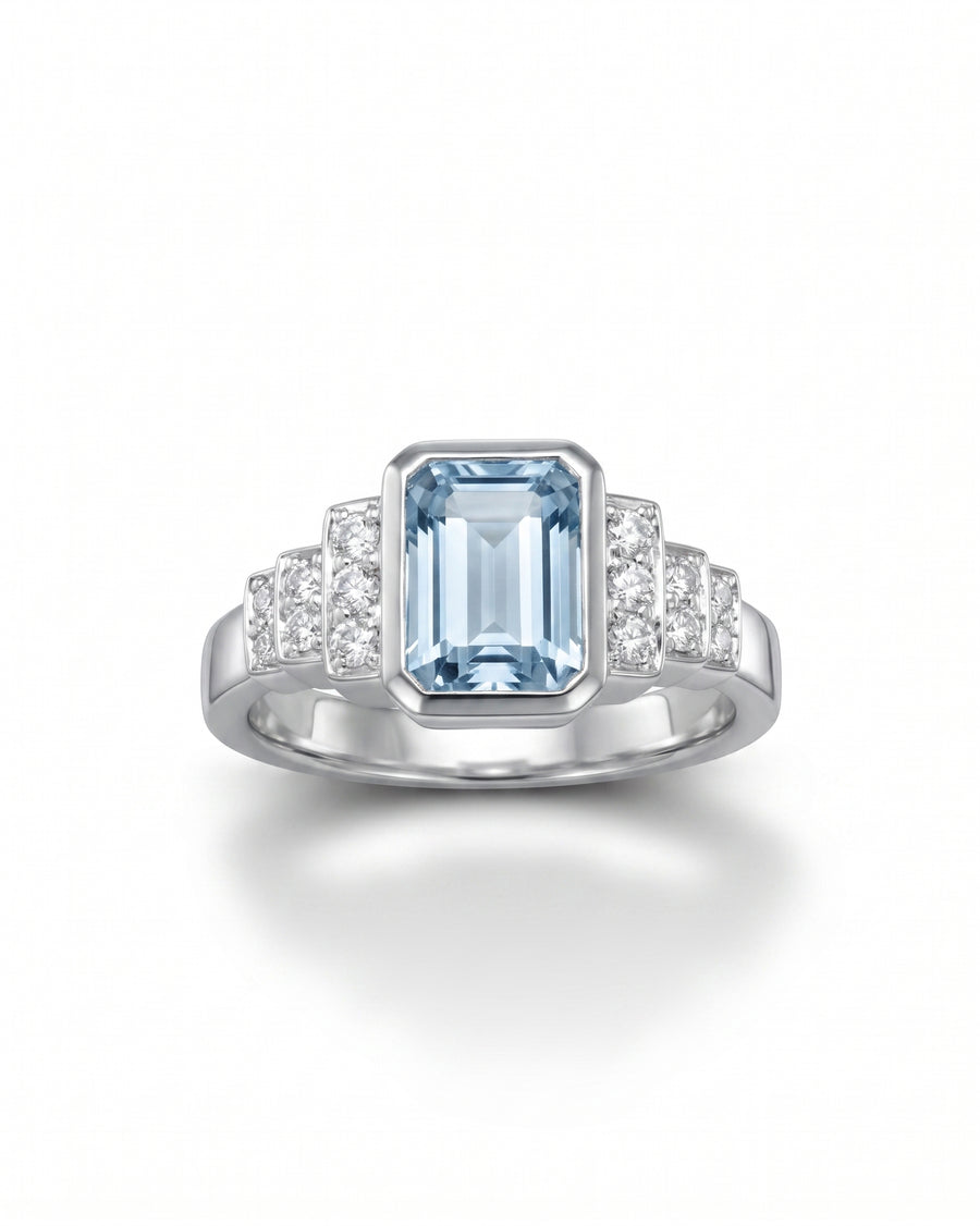 Aquamarine and diamond Art Deco inspired engagement ring in white gold.