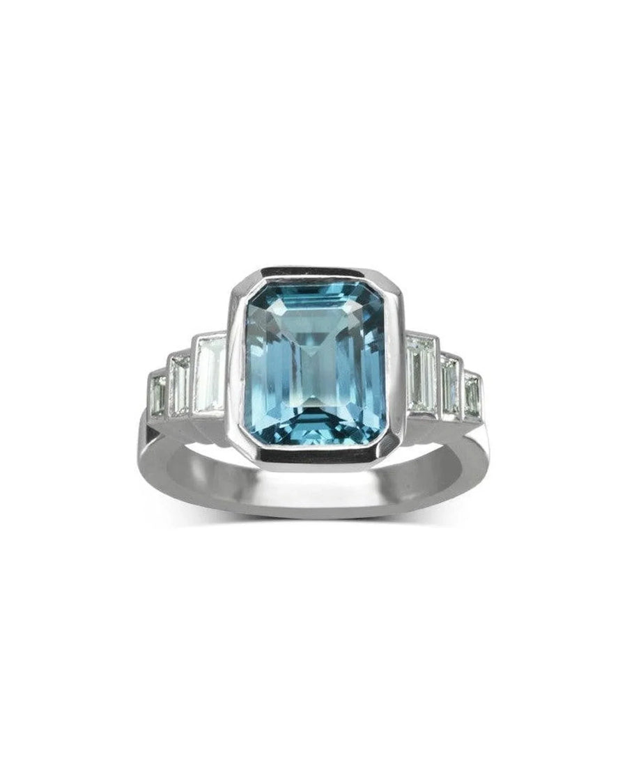 Art deco platinum ring with an emerald-cut aquamarine and stepped diamond shoulders