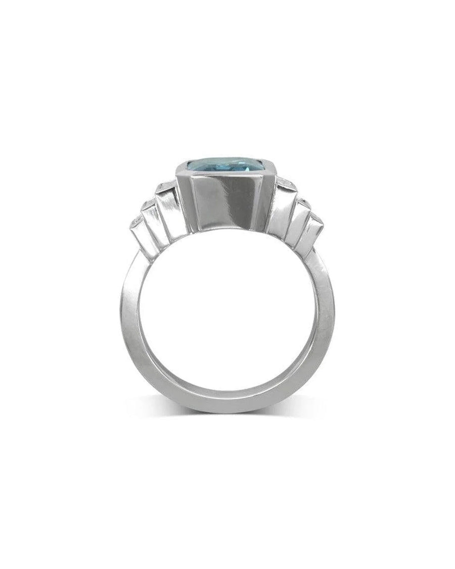 Art deco platinum ring with a central aquamarine gemstone and geometric detailing