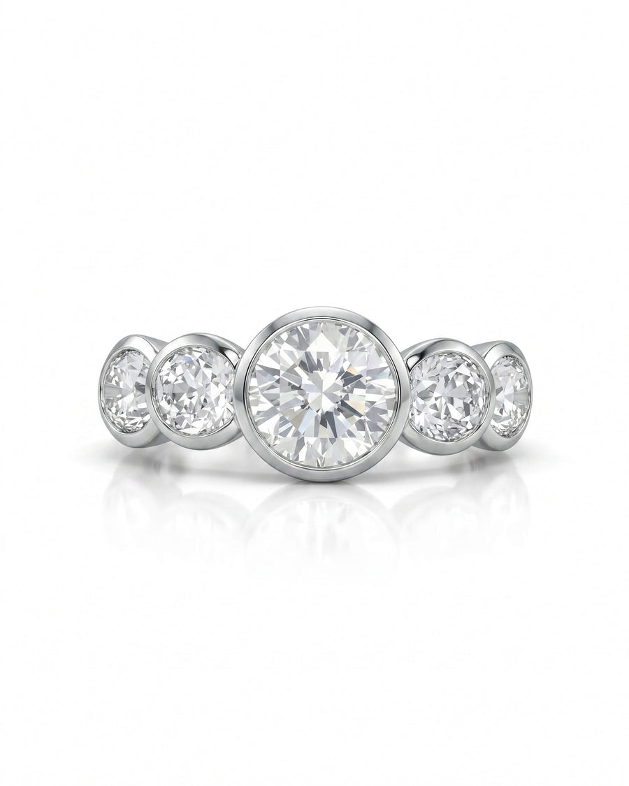 Platinum Art Deco engagement ring with five round brilliant cut diamonds.