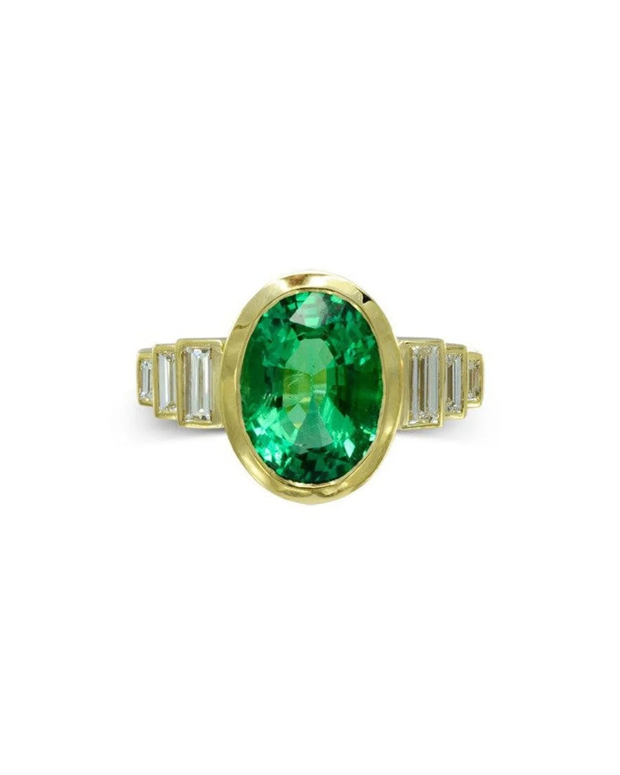 Art deco yellow gold ring with oval emerald center and baguette diamonds