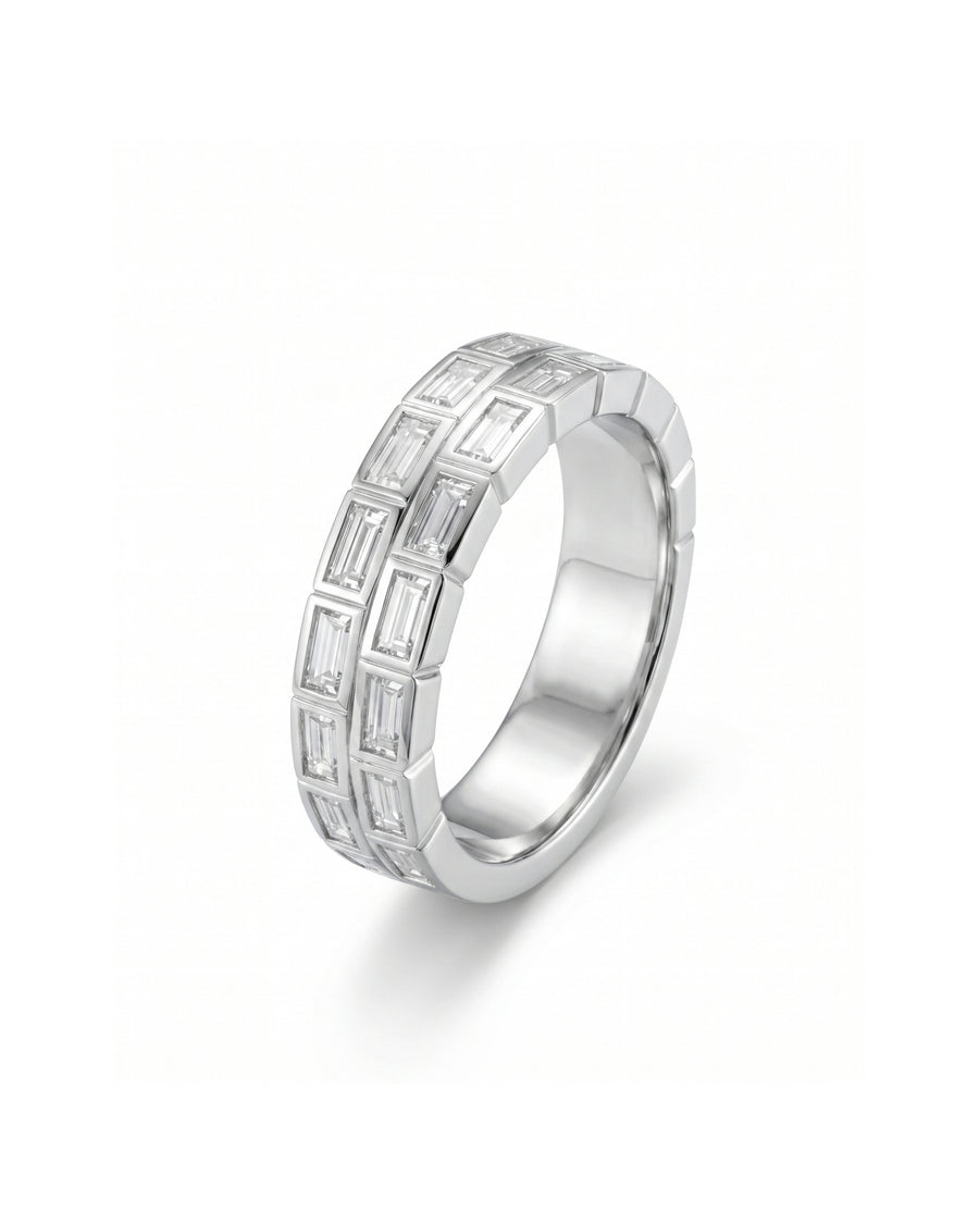 White gold eternity ring with two rows of baguette diamonds.
