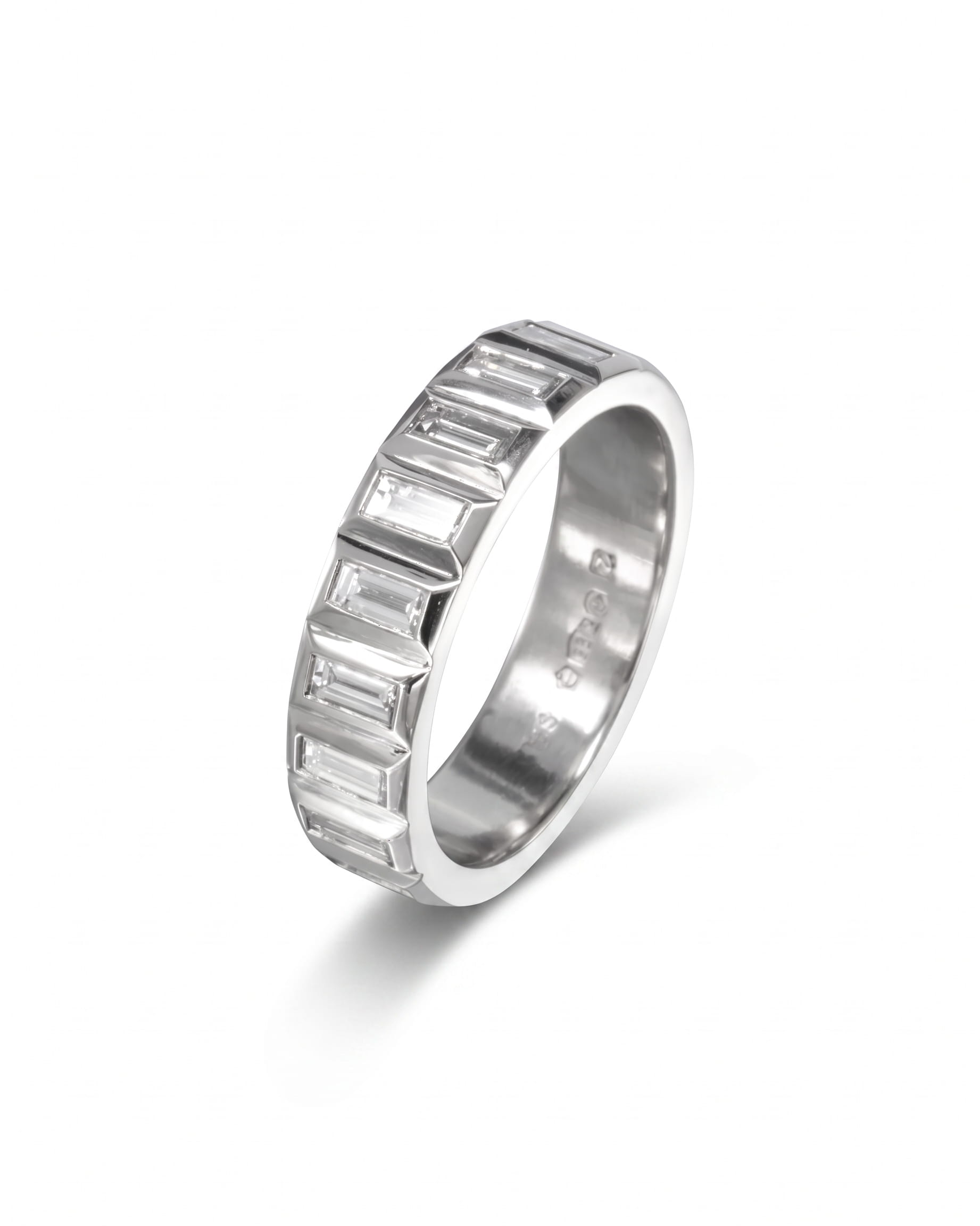 Platinum eternity ring with baguette diamonds.