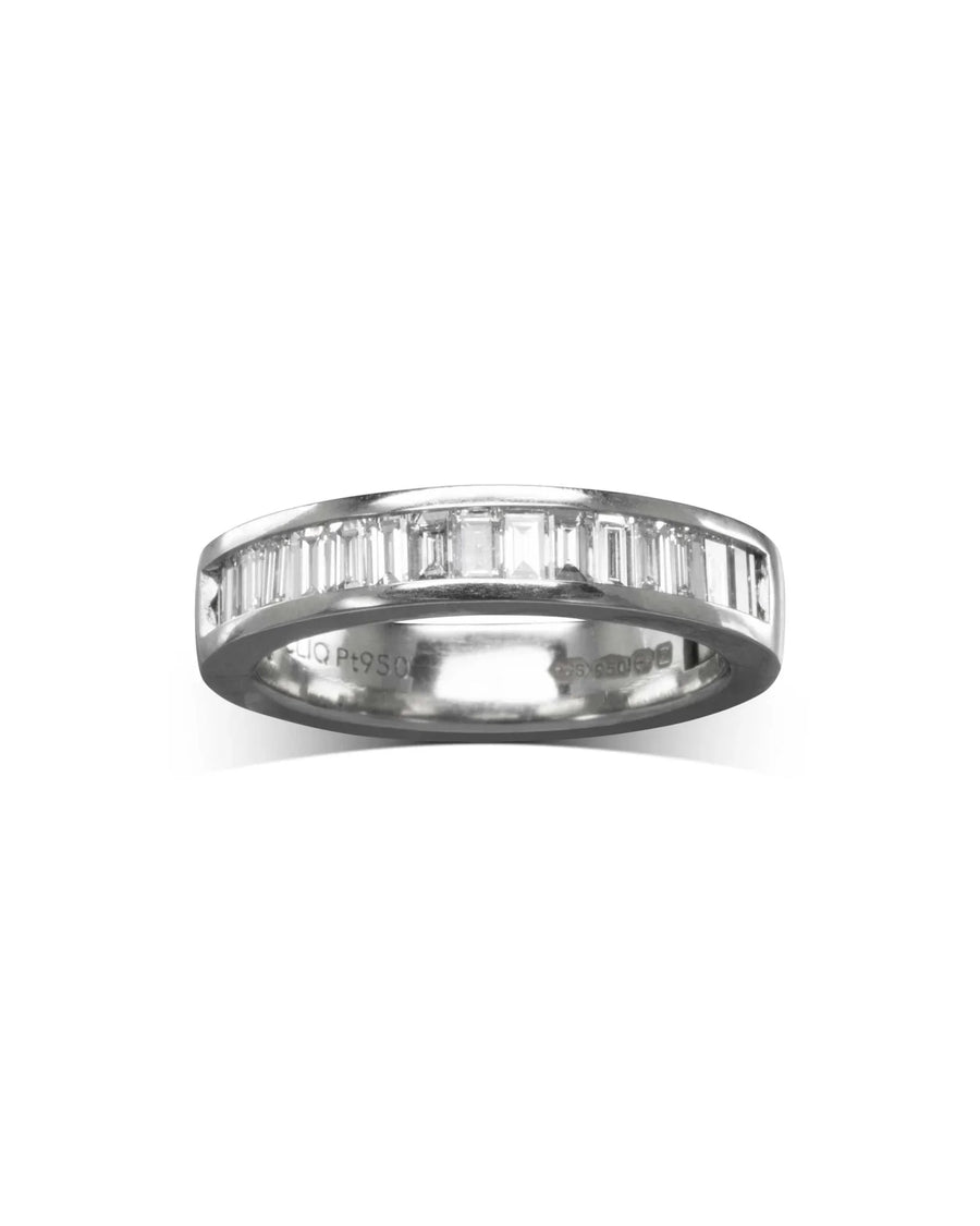 Platinum ring with baguette diamonds in an eternity band design.