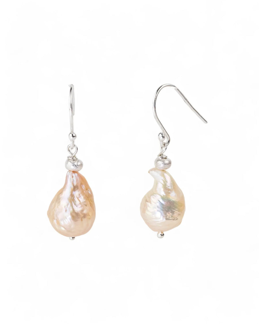 Silver drop earrings featuring irregular pink baroque pearls on simple wire hooks.