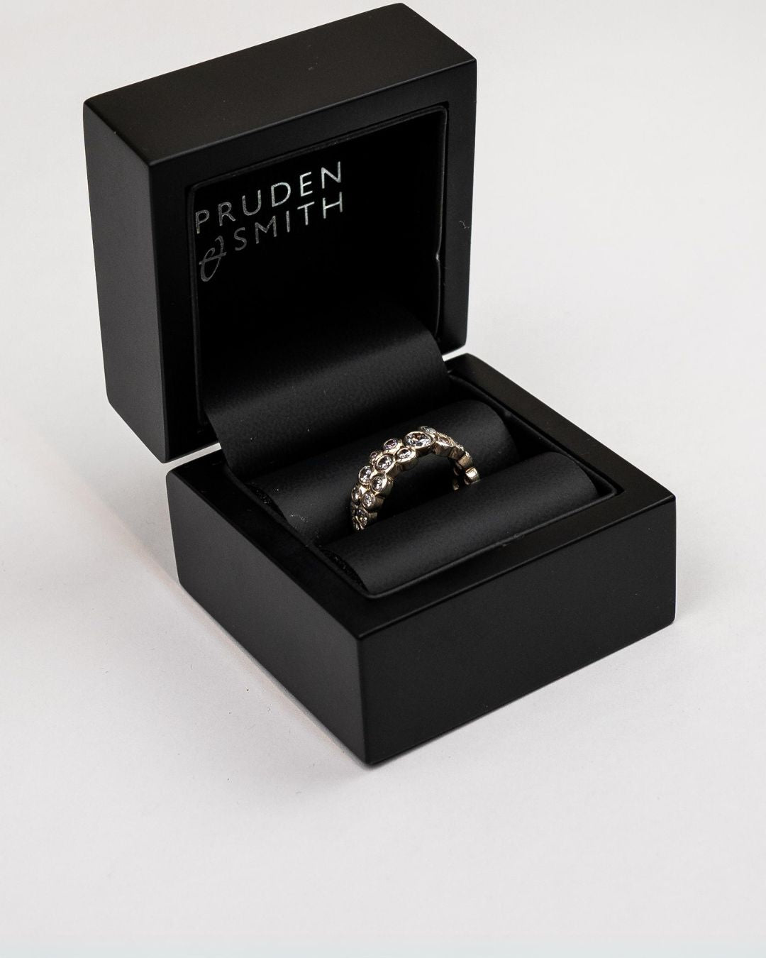 Handmade bespoke bubbles ring in a pruden and smith box